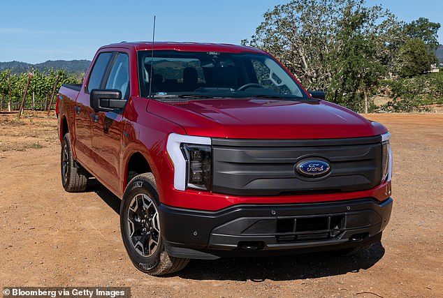 Ford will cut production of the F-150 Lightning in half from 3,200 per week to 1,600 next year, according to a recent memo shared with dealers and seen by Automotive News