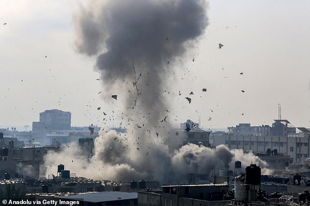 Smoke rising from buildings due to Israeli airstrikes after the humanitarian pause ended in Rafah, Gaza on December 1, 2023