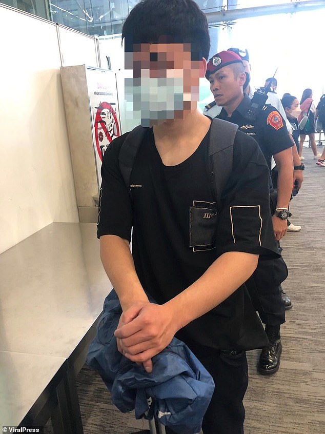 As the Taiwanese smuggler stood in line for airport security, he hoped staff wouldn't notice the huge bulge in his pants – and the fact that it kept moving