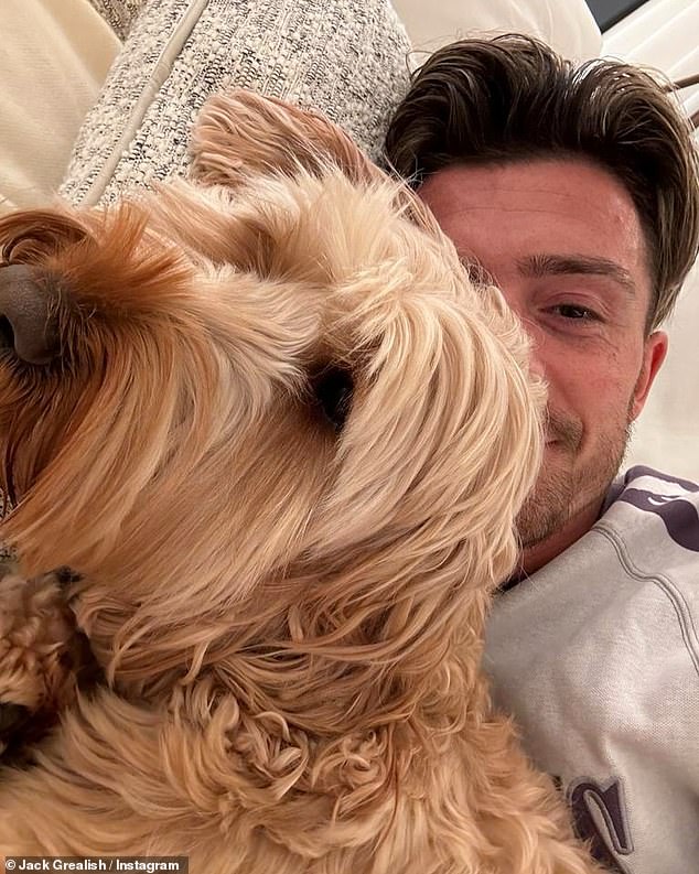 The 28-year-old footballer shared a photo of himself looking relaxed with his dog on Sunday and revealed his devastation over the 'traumatic' incident that left his loved ones terrified