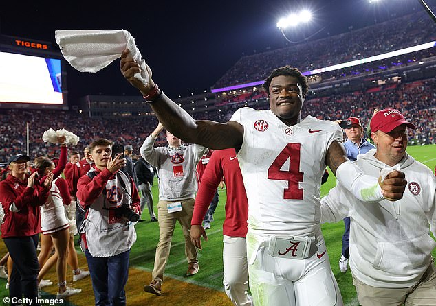 Jalen Milroe celebrates after his latest heroics led Alabama to victory over rival Auburn