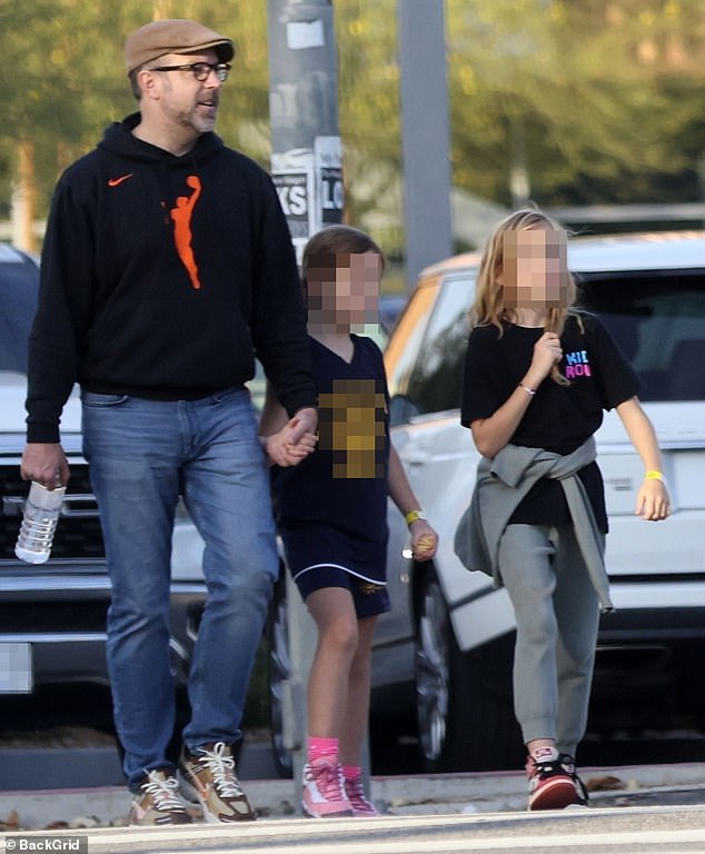 Jason Sudeikis played the role of a relationship with his father as he kept a close eye on his two children, including holding hands with the younger of the two, Daisy, after leaving a park.