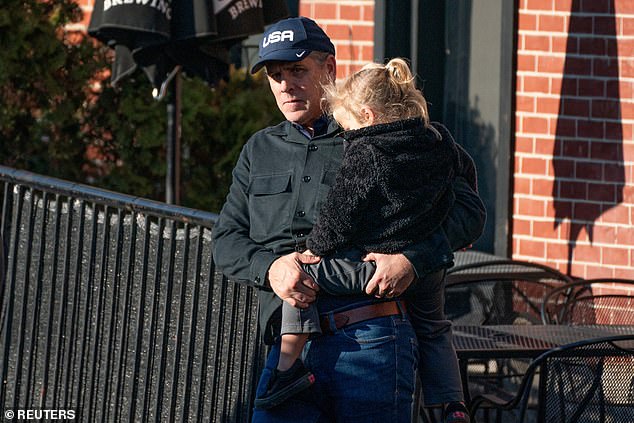 Hunter Biden (left) and baby Beau Biden (right) leave lunch with President Joe Biden at Rocco Italian Grill & Sports Bar in Wilmington, Delaware