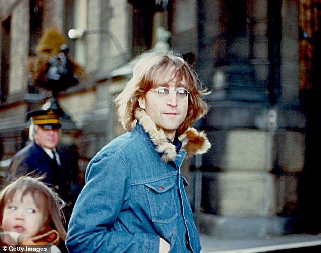 John Lennon (pictured) was shot outside the Dakota Building in Manhattan on December 8, 1980 as he returned home