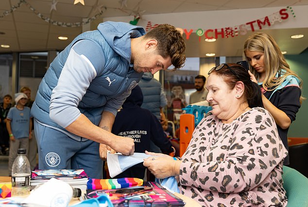 John Stones and some of his Manchester City teammates visited a local hospital to spread some Christmas cheer