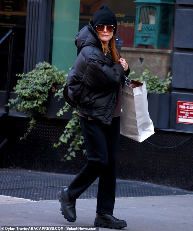 Julianne Moore cut a fashionable figure during a day of shopping in New York City's Soho neighborhood on Wednesday afternoon