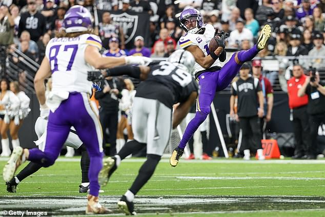 Justin Jefferson was injured on a huge hit by Las Vegas' Marcus Epps on a fly ball