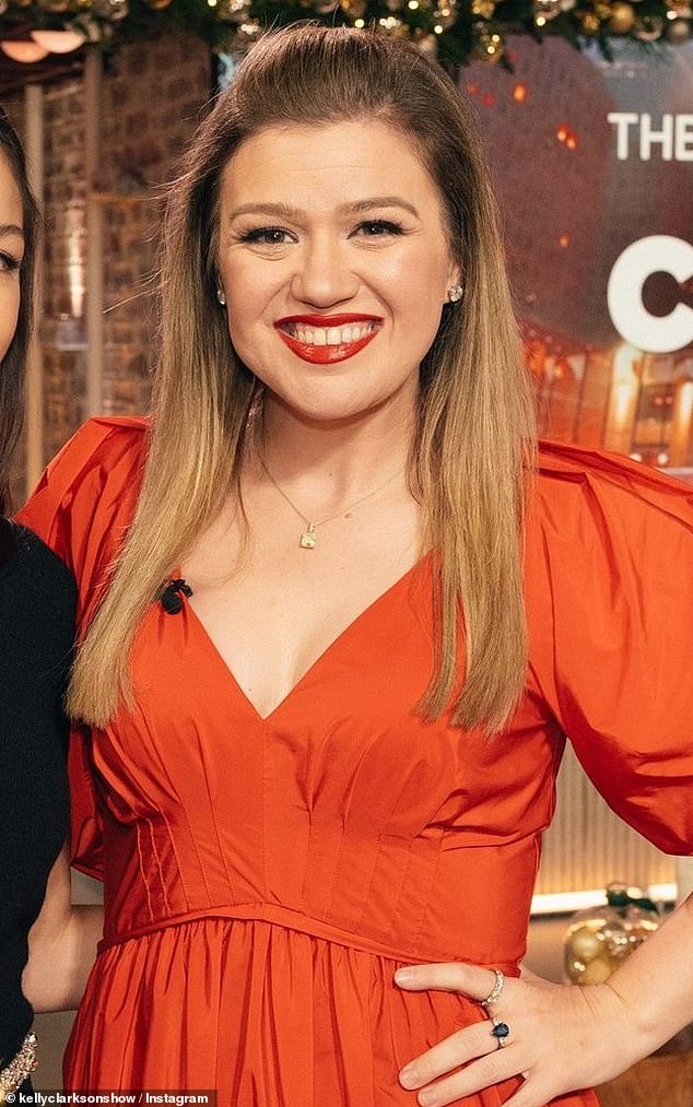 Kelly Clarkson looked radiant in a deep red dress on Tuesday during her eponymous talk show