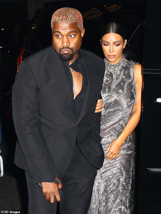 Kim and Kanye are pictured in December 2018