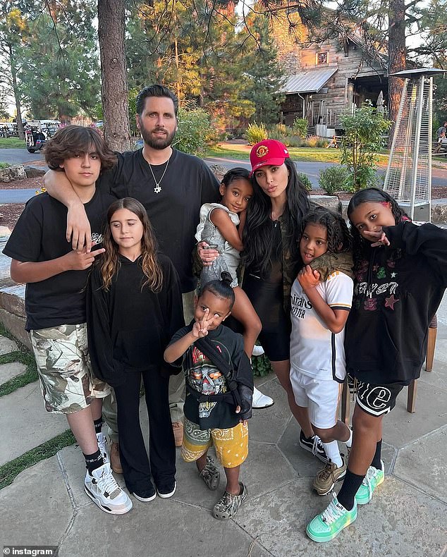 Earlier on Monday, Kim shared a family photo featuring both her four children and some of her sister Kourtney Kardashian's children, including Kourtney Kardashian and Scott Disick's son Mason, 13, who has rarely appeared in recent posts.