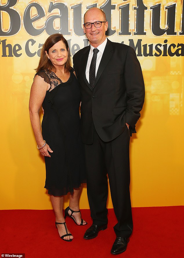 Financial expert David Koch (pictured right with wife Libby) recommends Australians buy a property in a smaller capital city or invest in healthcare stocks as interest rate rises slow the economy amid a cost-of-living crisis