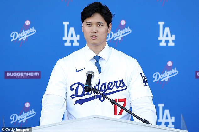 Shohei Ohtani speaks to the media after being introduced as a Los Angeles Dodger on Thursday