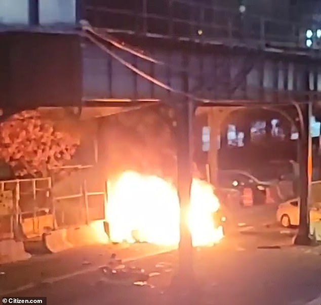 Dramatic videos show a Lamborghini catching fire in New York City after hitting a barrier.  Police saw the driver pull a driver out of the sports car before the fire.  A female passenger, 21, was killed in the crash