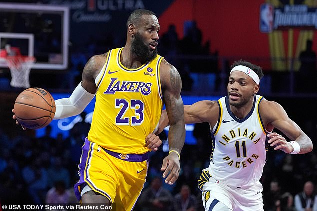 LeBron James (23) controls the ball against Indiana Pacers forward Bruce Brown