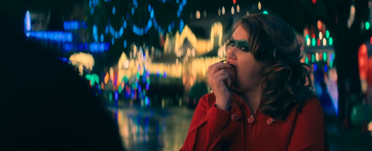 Jillian Bell's Pepper takes a big bite of a Christmas decoration