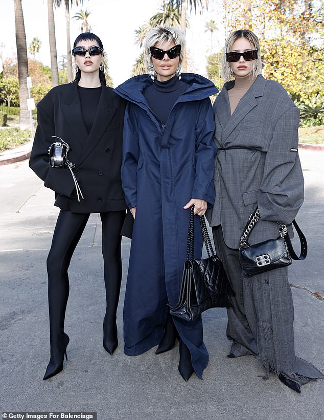 Lisa Rinna stole the spotlight at the star-studded Balenciaga show in LA on Saturday by appearing with her two beautiful daughters Delilah and Amelia