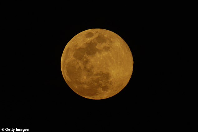 The full cold moon will reach maximum illumination tonight shortly after midnight, as this image from El Salvador shows