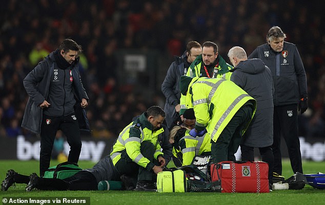 Luton captain Tom Lockyer was treated by medical staff after collapsing in the second half