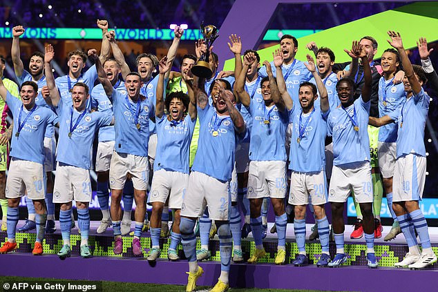 Kyle Walker lifts the Club World Cup trophy after Manchester City beat Fluminense 4-0 in the final