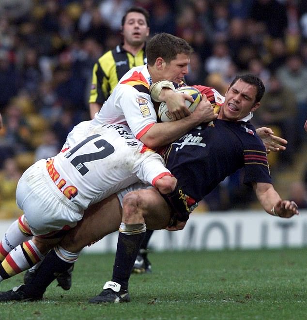 The woman who threatened Mestrov (pictured being tackled during his playing career) was not charged for her actions, but received a stern warning from police