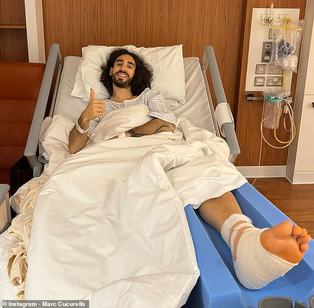 Marc Cucurella smiled and gave a thumbs up from a hospital bed after undergoing surgery