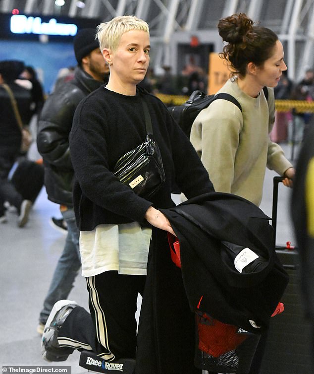 Megan Rapinoe arrived back in New York on Thursday after attending the wedding of former teammates Jess Fishlock and Tziarra King in Wales