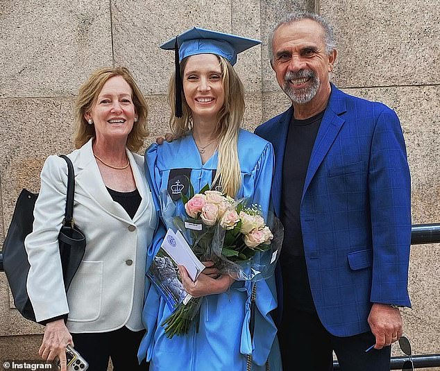 Jordan Zanzuri, 27, (center) and her father Clement Zanzuri, 71, (right) at Jordan's graduation from Columbia University last year