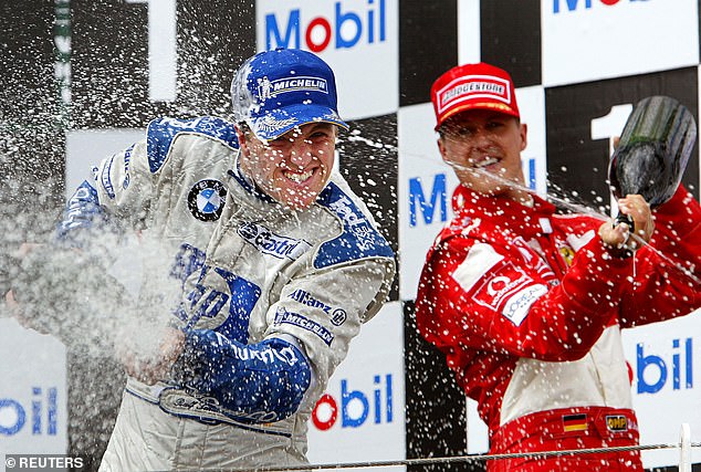 Ralf (left) and Michael (right) sharing the podium after the 2003 French Grand Prix