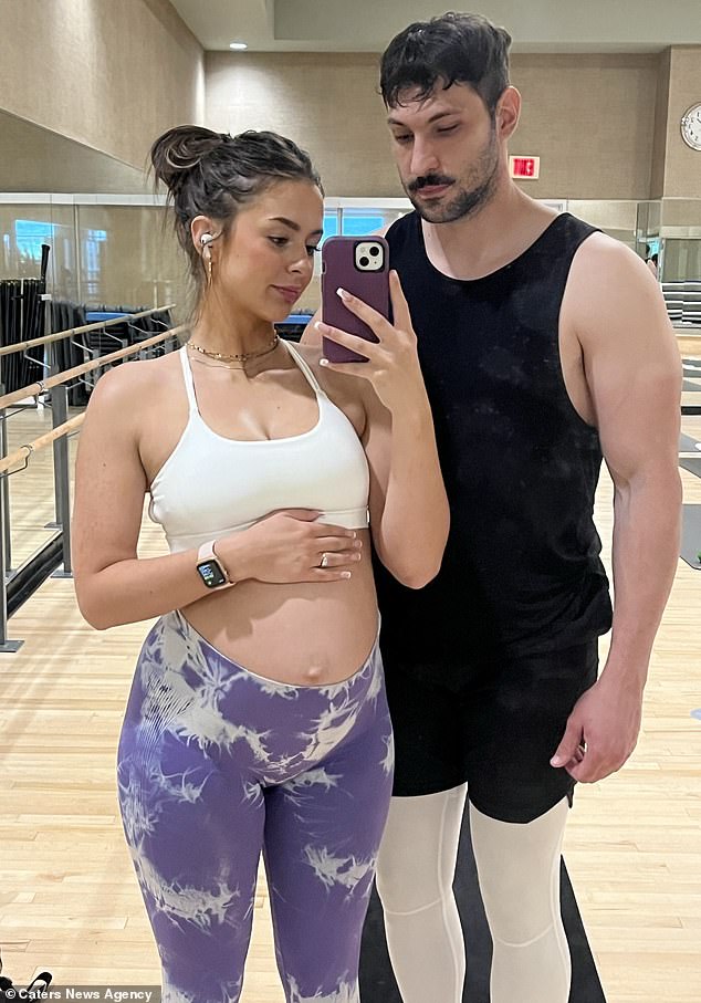 The 23-year-old (pictured with partner Nathan), who is expecting her second child, said: 'The biggest misconception about weightlifting during pregnancy is that you can't do it'