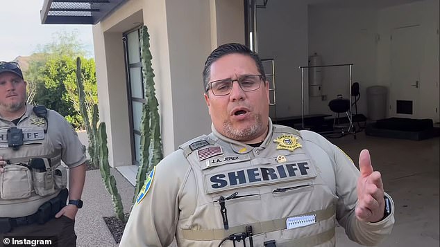 A Maricopa County officer tries to talk to Chandler Jones, who refused to listen