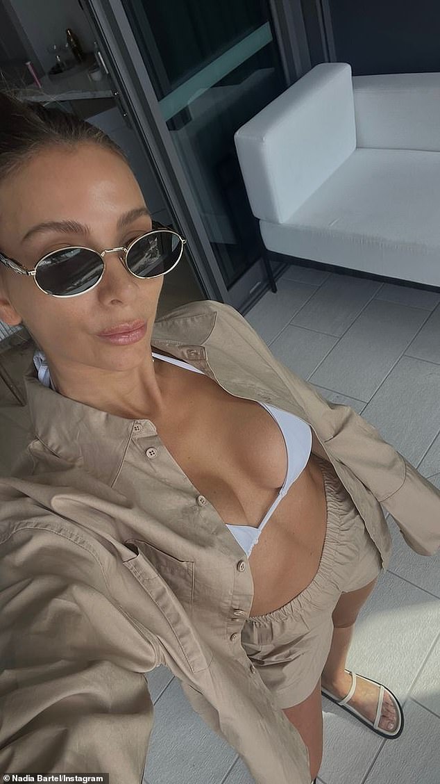 The former AFL WAG, 38, shared two stunning photos to her Instagram Stories capturing her best angles in a barely-there white bikini