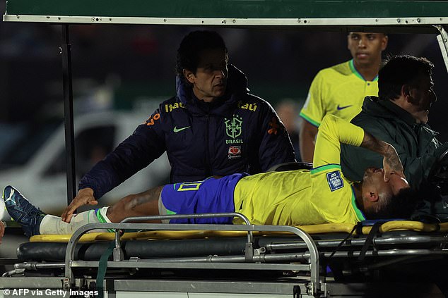 Brazilian striker Neymar leaves the field crying in pain after tearing his cruciate ligament against Uruguay in October.