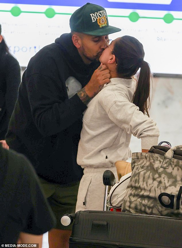 Tennis bad boy Nick Kyrgios was spotted passionately kissing girlfriend Costeen Hatzi at Sydney Airport as they arrived home before Christmas on Tuesday