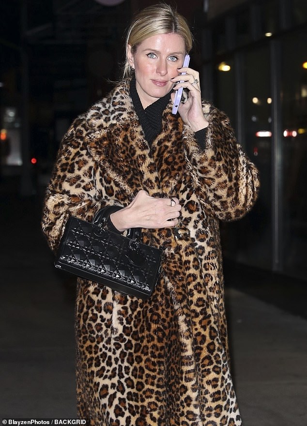 Nicky Hilton unleashed her animal instincts in a leopard print coat as she was spotted on the sidewalk in New York on Thursday