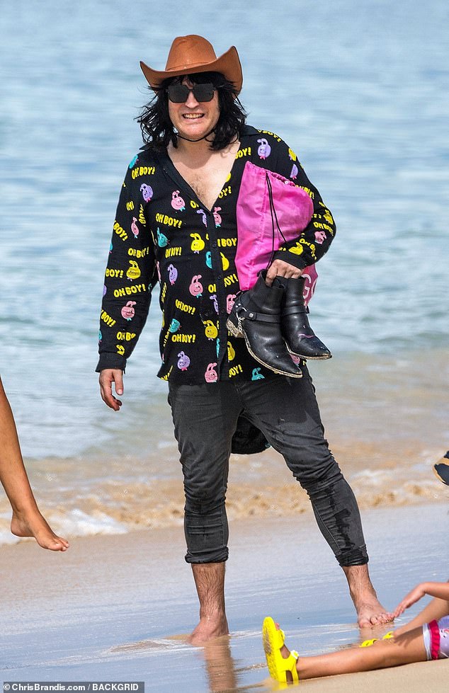 Dressed in a tan cowboy hat, partially unbuttoned bunny shirt and choker, Noel certainly caught the attention of onlookers as he headed out for a day on a hunt