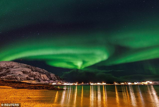 The Northern Lights are most commonly seen in places close to the Arctic Circle such as Scandinavia and Alaska, so any sighting over the UK is a treat for skygazers.  Pictured is the aurora borealis as seen in Sommarø, Norway, November 19, 2023