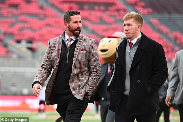 Brian Hartline (left) talks with senior advisor to Keenan Bailey in 2022 in Columbus, Ohio