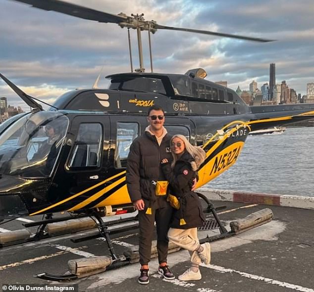 The duo also posed in front of a helicopter before taking a tour of New York from above