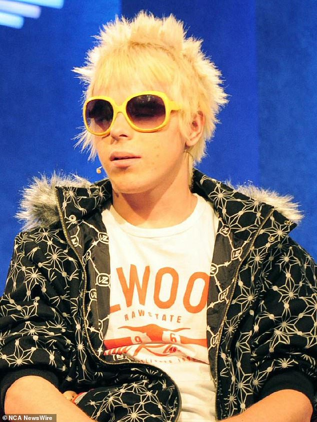 Worthington is seen at the height of his celebrity with bleach blonde hair and his signature yellow sunglasses