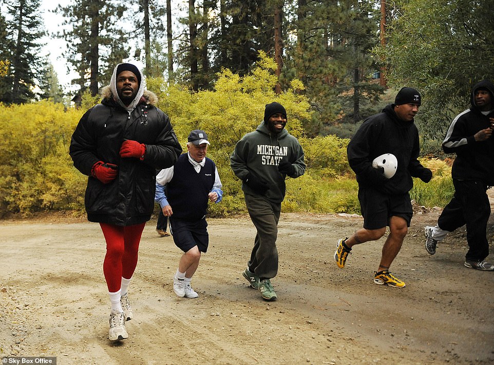 Keeping up the pace: Jeff Powell (center) goes for a run with Audley Harrison (left) at California's Big Bear Mountain in 2010