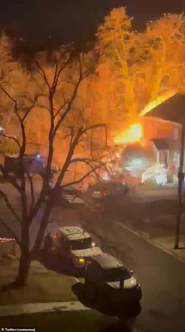 The house in Arlington, Virginia, exploded into flames during a standoff on Monday evening