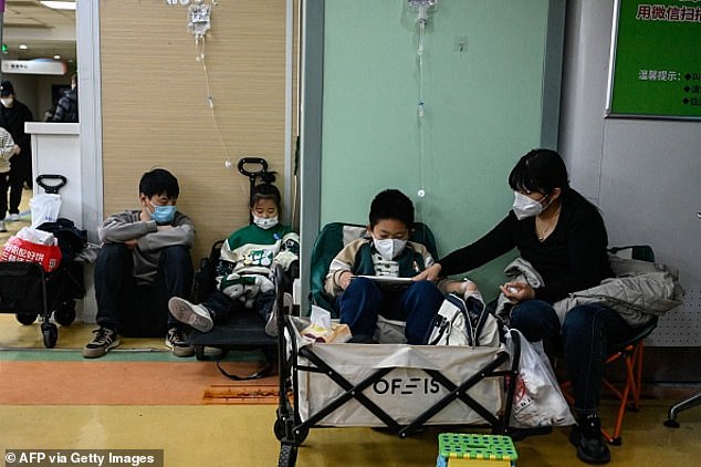 Children receive infusions at a children's hospital in Beijing on November 23, the same day the World Health Organization issued a statement on an increase in respiratory complaints in the country