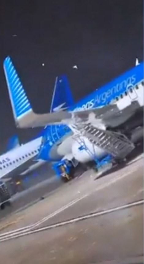 The Aerolineas Argentinas Boeing 737-700 was blown over the runway towards the stairs used by passengers to board