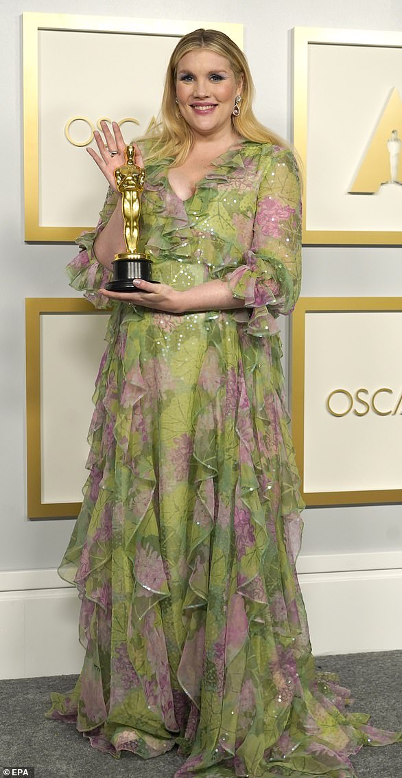 Emerald Fennell, 36 (pictured with her Oscar for Best Screenplay in April 2021) is the director of the aristocratic satire Saltburn