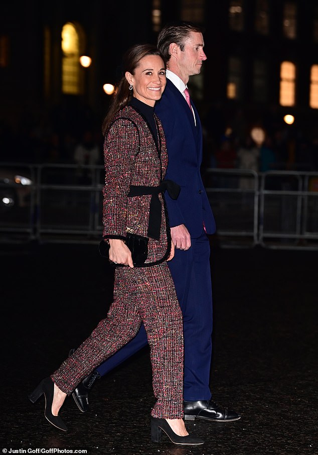 Pippa Middleton looked chic next to her husband James as they arrived at Kate's Christmas carol concert at Westminster Abbey this evening