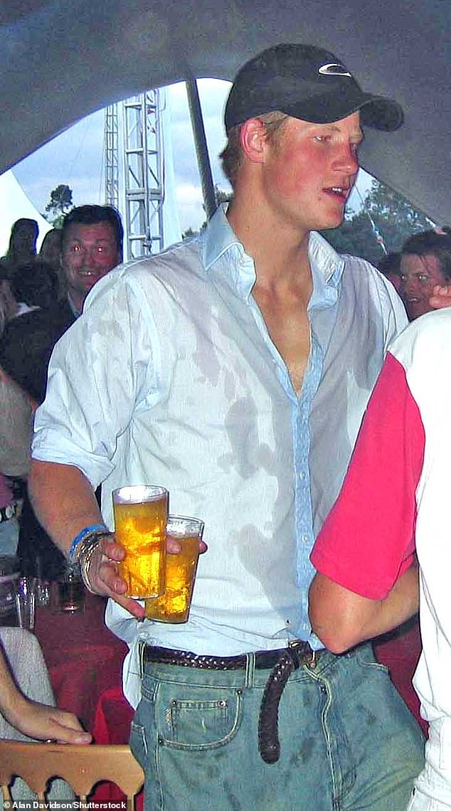 Prince Harry once tore a poster of his grandmother, Queen Elizabeth, off a club wall so she couldn't see his partying style, TV presenter Paddy McGuinness claims.  Pictured: Harry at the Chinawhite club