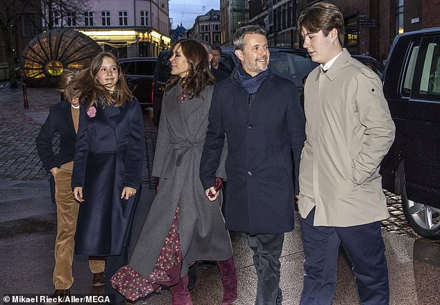 Crown Princess Mary of Denmark was spotted holding hands with husband Prince Frederik as she attended a church service on Christmas Eve with their four children