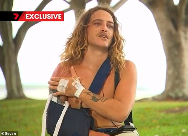 Commercial diver Matthew Davitt (pictured) recalls the terrifying moment he found himself in a 'bloodbath' after being attacked by a bull shark in far North Queensland