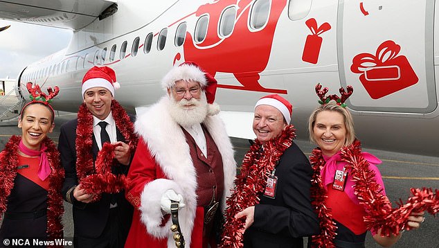 Bob Katter has accused Qantas of being anti-Christian after claiming the national airline had snubbed traditional Christmas carols in one of its prestigious business class lounges.