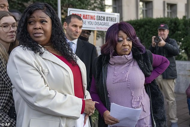 Shaye Moss (left) and her mother Ruby Freeman (right) are seen outside court on December 15.  On Wednesday, the judge said they should be paid immediately, warning that Giuliani could try to hide his money